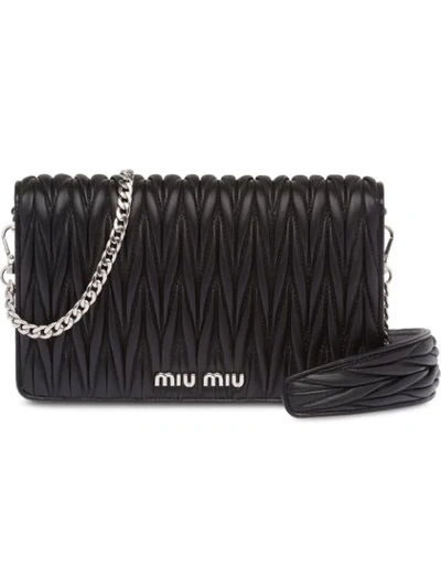 Shop Miu Miu Matelassé Logo Cross-body Bag In Black