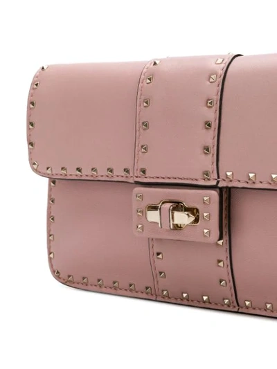 Shop Valentino Garavani Rockstud Crossbody Bag In Pink