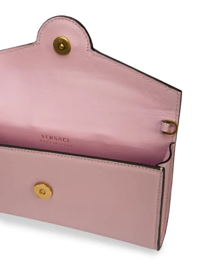 Shop Versace Foldover Medusa Clutch - Pink