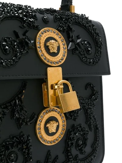 Shop Versace Embellished Medusa Shoulder Bag In Black
