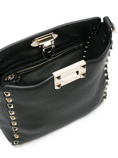 Shop Valentino Garavani Rockstud Messenger Bag In Black