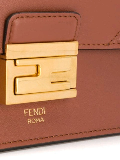 Shop Fendi Kan U Cross Body Bag In Brown