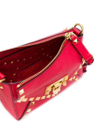 Shop Valentino Garavani Small Rockstud Shoulder Bag In Red