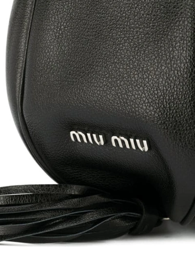 Shop Miu Miu Tassel Detail Bucket Bag In Black