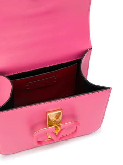 Shop Valentino Garavani Vlogo Crossbody Bag In Pink