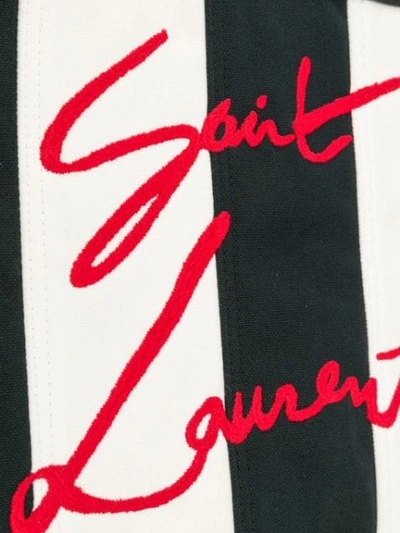 Shop Saint Laurent Logo Embroidered Striped Clutch In Black