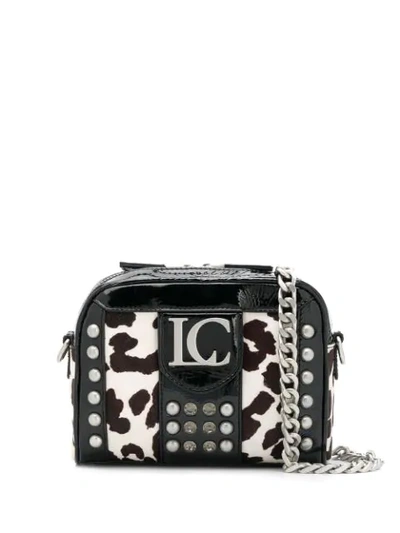 Shop La Carrie Cow Print Crossbody Bag In Black