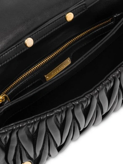 Shop Miu Miu Matelassé Leather Mini Bag In Black