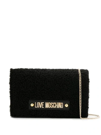 Shop Love Moschino Shearling Cross Body Bag In Black