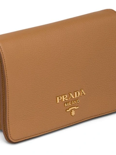 Shop Prada Logo-embellished Shoulder Bag In Brown