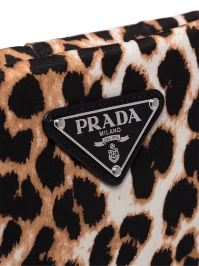 Shop Prada Leopard Print Clutch In Brown
