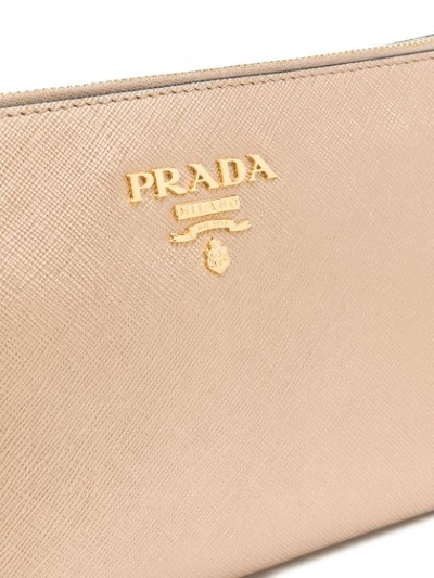 Shop Prada Top Zip Logo Clutch - Metallic