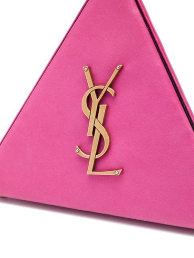 Shop Saint Laurent Monogram Pyramid Clutch - Pink