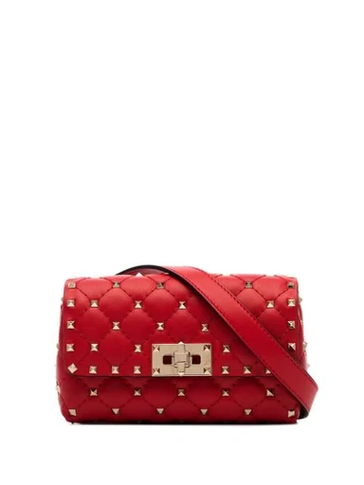Shop Valentino Rockstud Belt Bag In Red