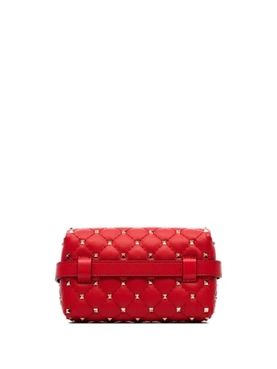 Shop Valentino Rockstud Belt Bag In Red