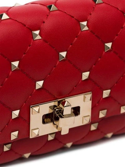Shop Valentino Rockstud Belt Bag In Red