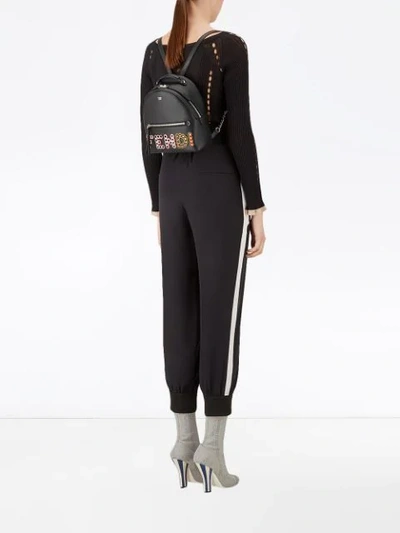 Shop Fendi Embellished Logo Backpack In Black