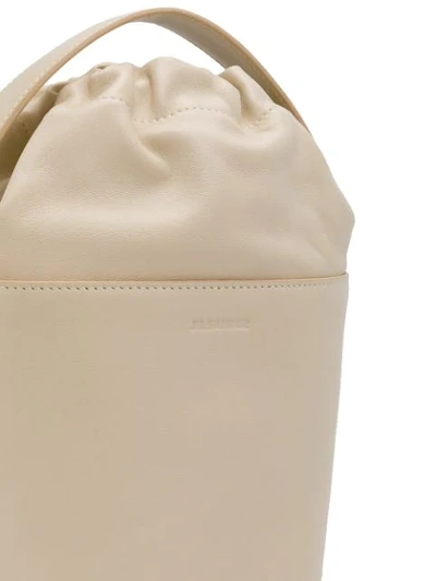 Shop Jil Sander Top Handle Bucket Bag In Neutrals