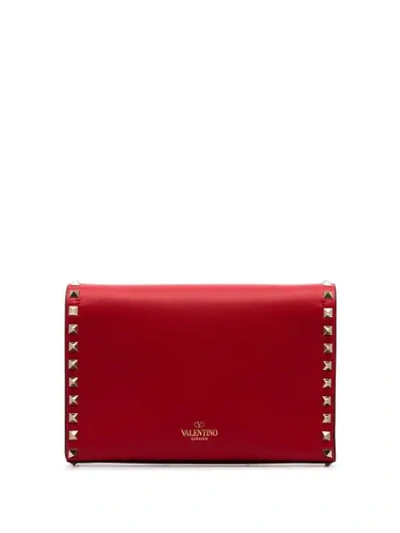 Shop Valentino Rockstud Crossbody Bag In Red