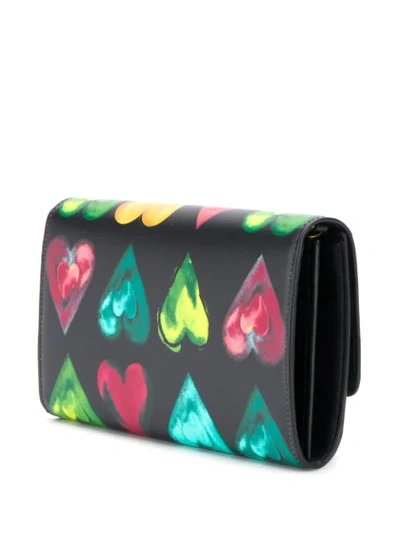 Shop Versace Heart Print Clutch In Dnmot