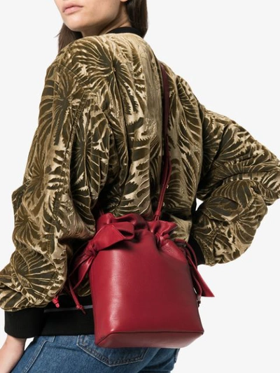 Shop Simone Rocha Red Bow Appliqué Leather Bucket Bag