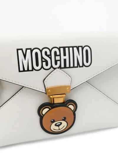 Shop Moschino Teddy Bear Envelope Clutch In White