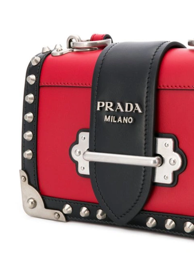 Shop Prada Small Cahier Studs City Crossbody Bag - Red