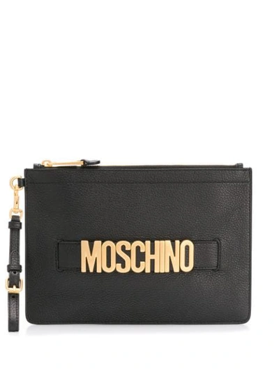 Shop Moschino Logo Plaque Clutch Bag In Black