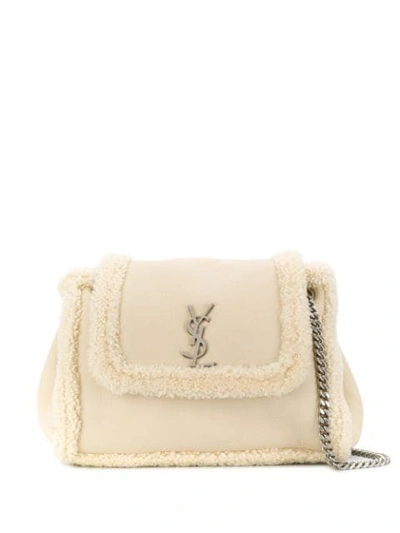 Shop Saint Laurent Nolita Shearling Shoulder Bag In White