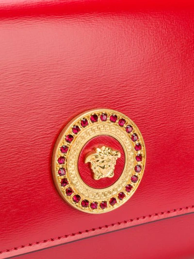 Shop Versace Medusa Plaque Clutch In Red