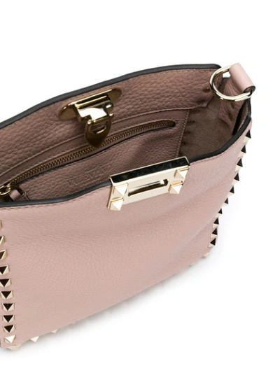 Shop Valentino Garavani Rockstud Messenger Bag In Neutrals