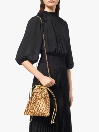 Shop Prada Mesh Drawstring Bag In Gold