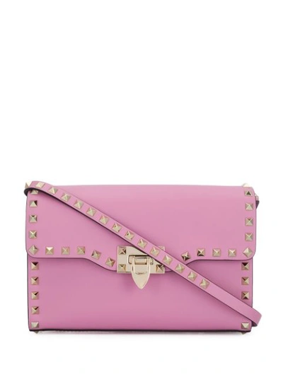 Shop Valentino Garavani Rockstud Crossbody Bag In Pink