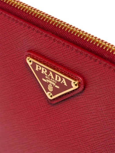 Shop Prada Clutch Mit Logo-schild In Red