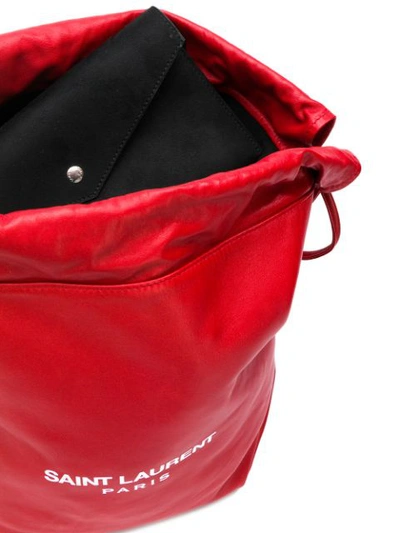 Shop Saint Laurent Red Pochon Logo Print Leather Drawstring Shoulder Bag