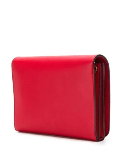 Shop Love Moschino Studded Clutch Bag In Red