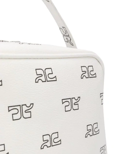 Shop Courrèges Logo Print Cross Body Bag In White