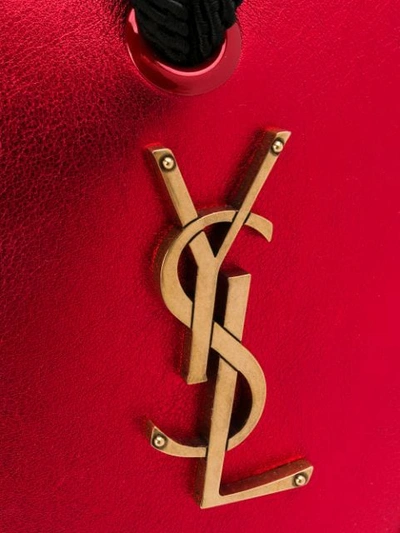 Shop Saint Laurent Monogram Heart Metallic Clutch In Red