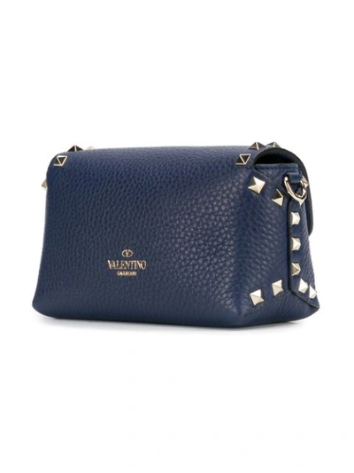 Shop Valentino Mini Rockstud Crossbody Bag In Blue