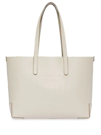 Shop Burberry Embossed Monogram Motif Leather Tote In Neutrals
