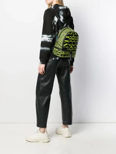 Shop Michael Michael Kors Rhea Medium Newsprint Backpack In Black