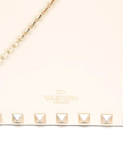 Shop Valentino Rockstud Clutch Bag In White