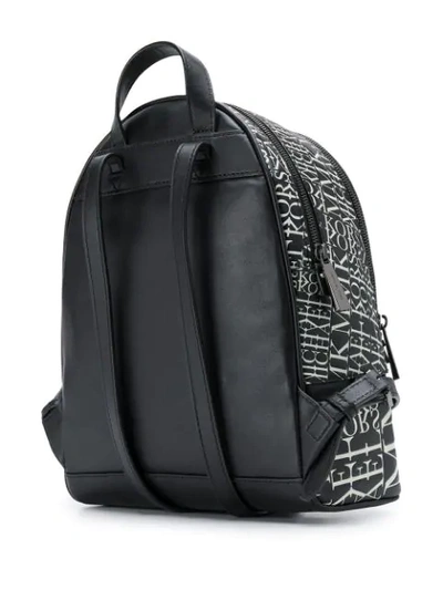 Shop Michael Michael Kors Rhea Medium Newsprint Logo Backpack In Black