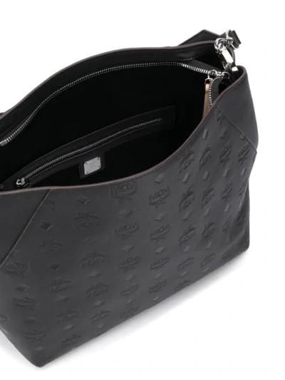 Shop Mcm Logo Embossed Shoulder Bag In Black