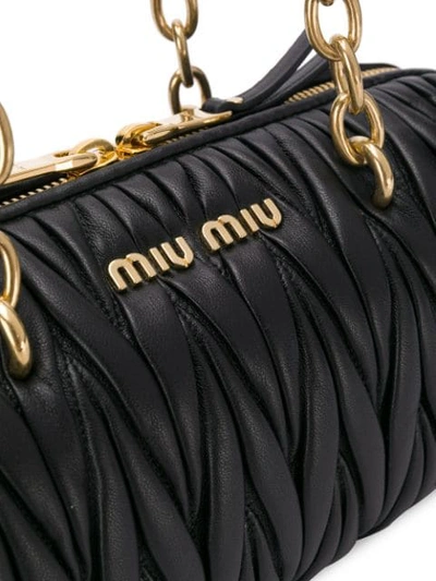 Shop Miu Miu Matelassé Shoulder Bag In Black