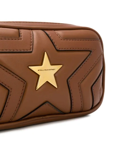 Shop Stella Mccartney Stars Belt Bag In Brown