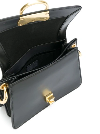 Shop Karl Lagerfeld Cat Lock Cross-body Bag - Black