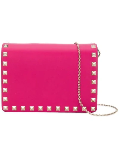 Shop Valentino Garavani Rockstud Pouch Bag - Pink