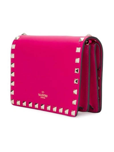 Shop Valentino Garavani Rockstud Pouch Bag - Pink