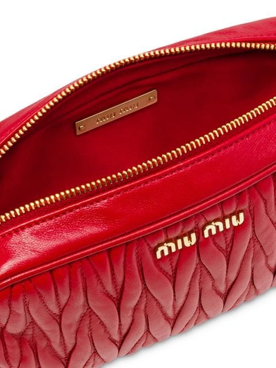 Shop Miu Miu Matelassé Belt Bag - Red